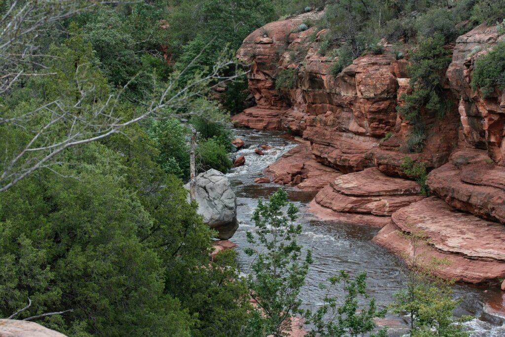 a river flowing through a canyon in Sedona